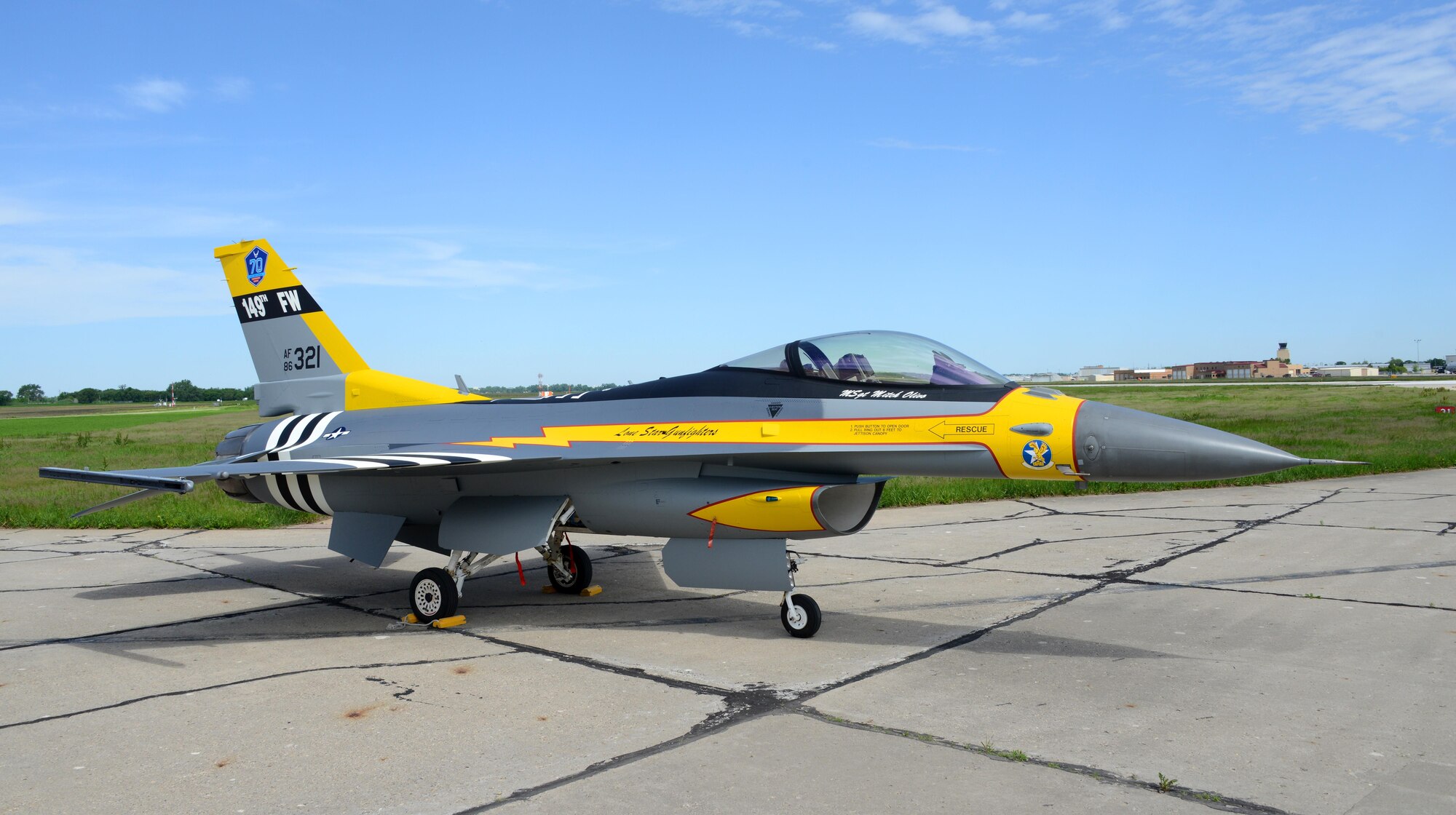 A U.S. Air Force F-16 assigned to the 149th Fighter Wing, Texas Air National Guard, painted with World War II heritage markings is parked outside the Air National Guard Paint Facility in Sioux City, Iowa on May 26, 2017. The 149th FW received authorization for the nonstandard markings in order to commemorate the United States Air Force 70th Anniversary. The markings represent the lineage of the 149th FW with the unit’s origins dating back to the 396th Fighter Squadron “Thunder Bums” P-47 paint scheme from 1944. 
U.S. Air National Guard Photo by: Master Sgt. Vincent De Groot 185th ARW PA/Released