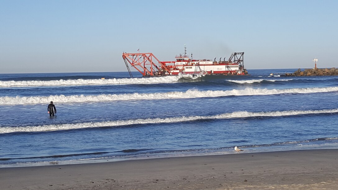 Manson Construction Company dredge, the HR Morris, operates just outside the north jetty at Oceanside Harbor as part of the annual maintenance project to provide a safe navigation channel for military, commercial and private vessels.