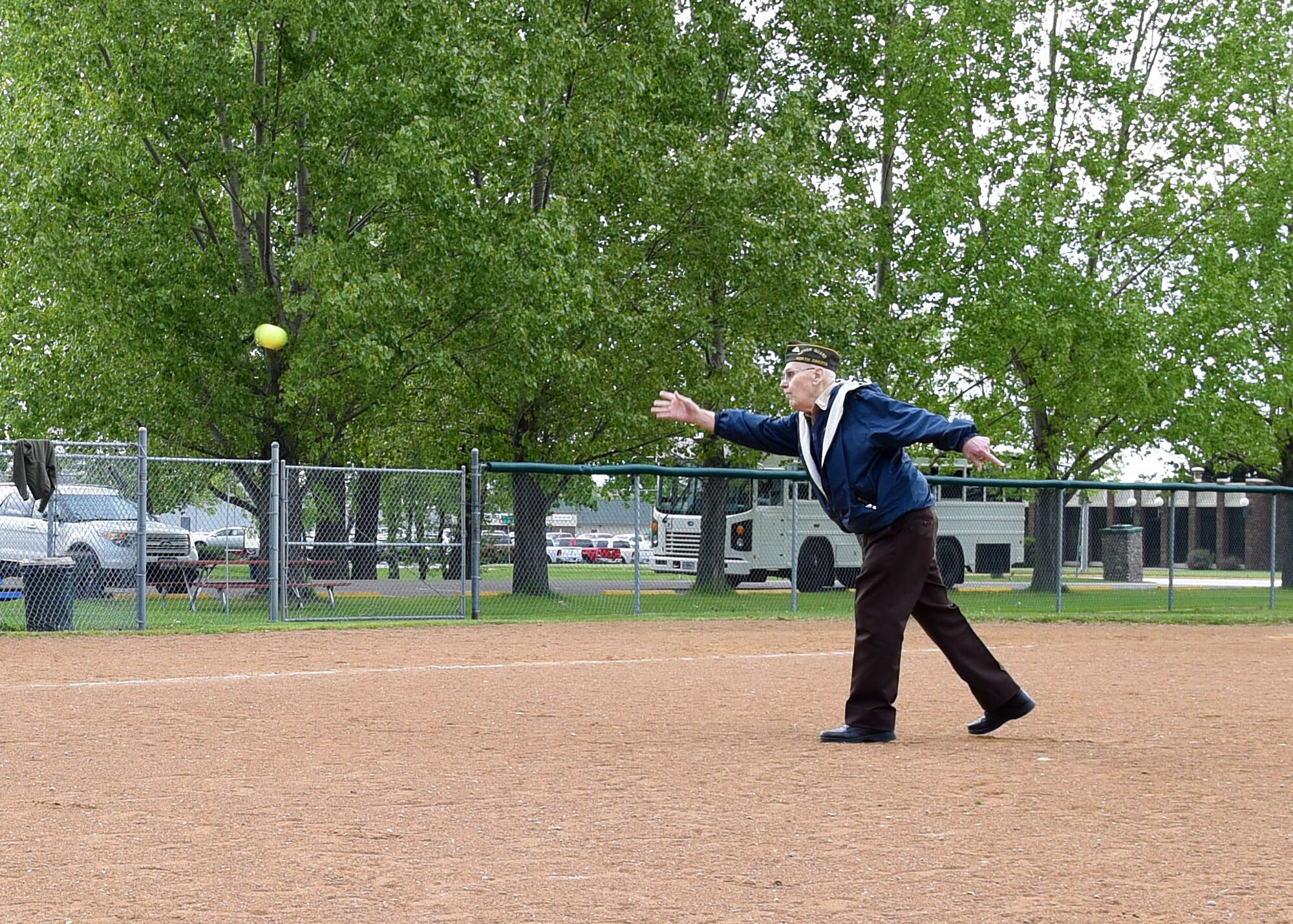 An Army Air Corps veteran, 93, makes the first pitch of the annual Grand Forks AFB versus Minot AFB softball game May 25, 2017, at Devil’s Lake, N.D. His pitch kicked off the day’s activities, which included two scrimmages before the “official” game. (U.S. Air Force photo by Airman 1st Class Elora McCutcheon)