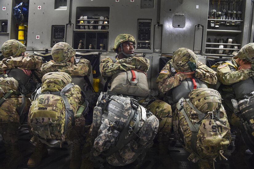 Army Staff Sgt. Primus Treavor, 82nd Airborne Division maintenance control supervisor, waits before jumping out of a C-17 Globemaster III from Joint Base Charleston, S.C., May 25, 2017. The 82nd Abn. Div. celebrated their 100th anniversary during All American Week with a planned jump from the large formation exercise. 