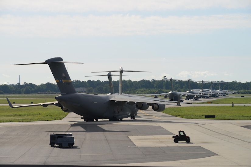 C-17 Globemaster IIIs from the 437th Airlift Wing, Joint Base Charleston, S.C., prepare for take-off in support of a Large Formation Exercise, May 25, 2017. Twenty one C-17s were involved in the integrated large formation exercise supporting the U.S. Army’s 82nd Airborne Division’s joint forcible entry exercise at Fort Bragg, N.C., as part of All American Week and the 82nd Abn. Div.’s 100th anniversary.