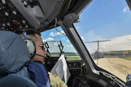 U.S. Air Force Capt. Rodrigo Vargas, 14th Airlift Squadron pilot, prepares for takeoff during a Large Formation Exercise here, May 25, 2017. The LFE tested the 437th and 315th AW’s abilities to complete a joint forcible entry airdrop with the 82nd Airborne Division from Pope Army Airfield.
