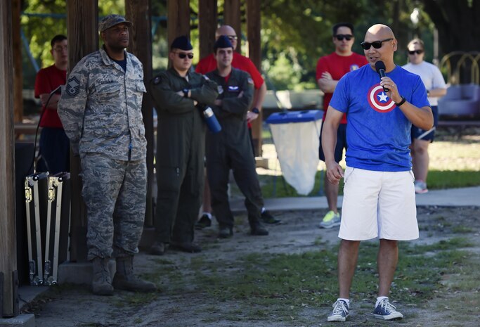 Col. Jimmy Canlas, 437th Airlift Wing commander, talks to Airmen and civilians during the 437th AW picnic at Joint Base Charleston, S.C., May 26. Attendees were able to compete in sports and play games during the event such as basketball, dodge ball, tug-of-war and ultimate Frisbee. (U.S. Air Force photo by Staff Sgt. Christopher Hubenthal)