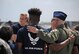 Air Force Maj. Gen. Garrett Harencak, Air Force Recruiting Service commander, stands for a photo with Delayed Entry Program Air Force recruits during the Memorial Day weekend National Salute to America’s Heroes Miami Air and Sea Show at U.S. Coast Guard Air Station Miami in Opa-Locka, Fla., May 26, 2017. A swear-in ceremony was held to recognize new recruits who took the Oath of Enlistment into the U.S. Armed Forces. Approximately 97 Air Force recruits were sworn-in during the joint-service event which is held to educate the public, and increases awareness and understanding of each branch’s unique mission. (U.S. Air Force photo by Senior Airman Erin Trower)