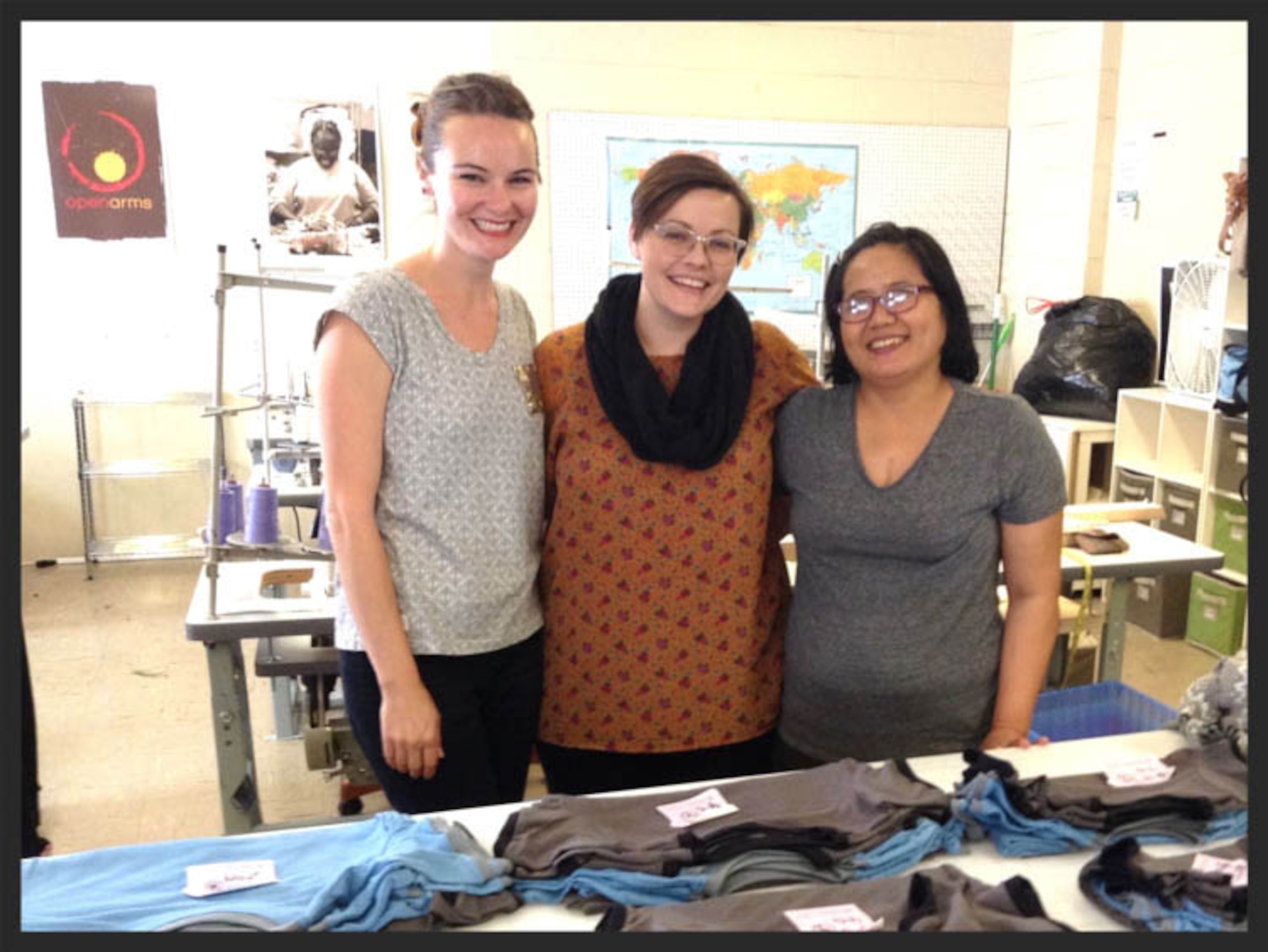 (Left to right) Evan Menendez, owner of Evan Brooke Ethical Clothing, Emily Sidle, production director, and Thaang Zuali, sewing manager of Open Arms Manufacturing,  lead a “USA-Made” sustainable apparel and sewn goods manufacturer which empowers refugee women through fair-wage employment, located in Austin, Texas (Courtesy photo)