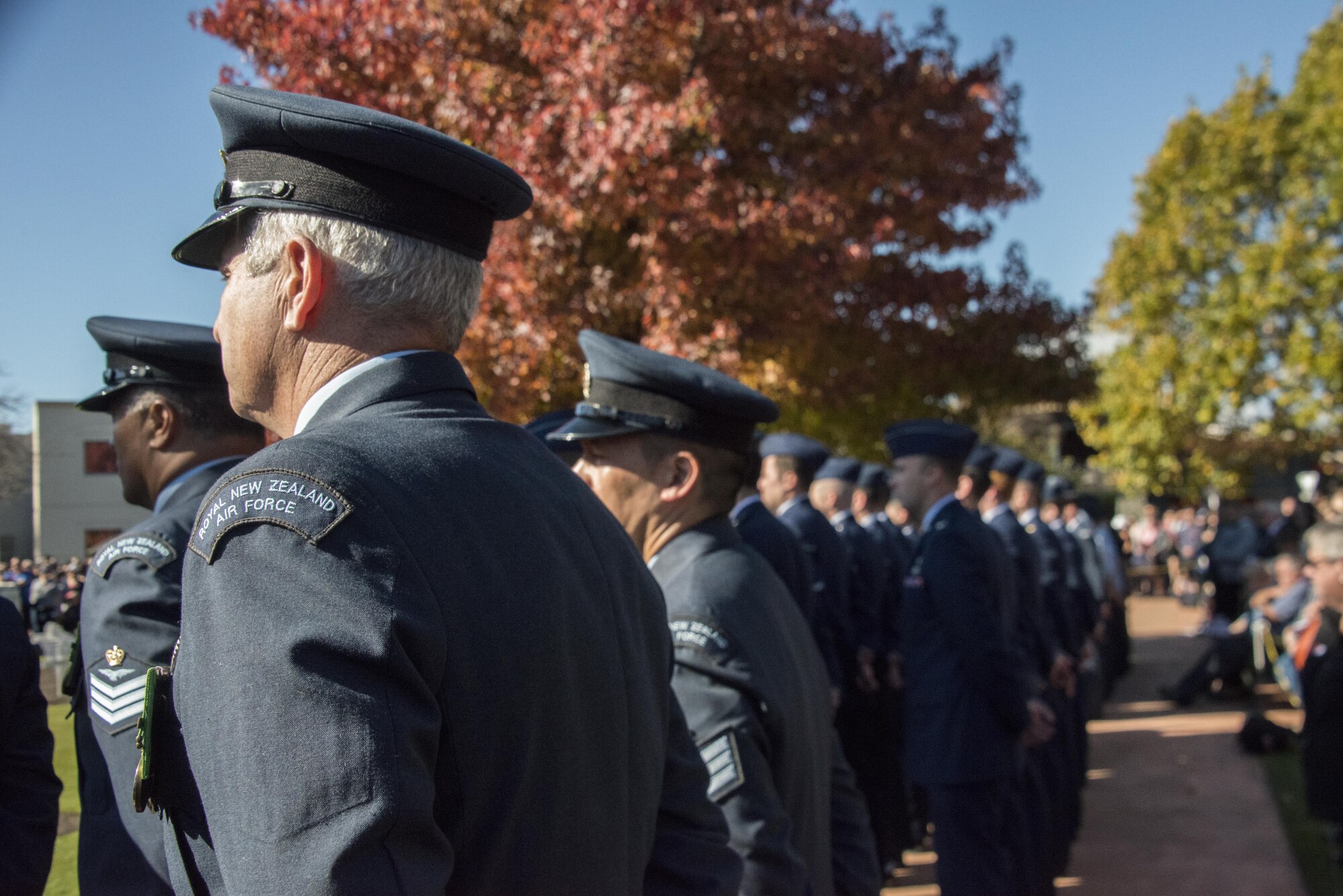 Royal New Zealand Air Force 40th Squadron and U.S. Air Force 353rd Special Operations Group members stand in formation during the ceremonial portion of the ANZAC Day commemoration, April 25, 2017 in Blenheim, New Zealand. Throughout Exercise Teak Net, the 353rd SOG and 40th SQDN demonstrated the strength of a partnership that has evolved over the years. (U.S. Air Force photo by Capt. Jessica Tait)