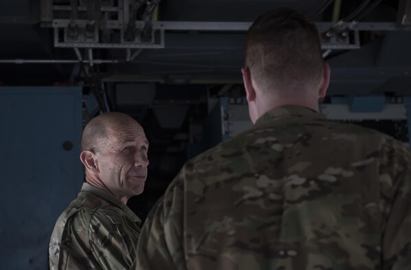 Gen. Mike Holmes, commander of Air Combat Command, speaks with Maj. Jonathan Wellman, 41st Expeditionary Electronic Combat Squadron, at Bagram Airfield, Afghanistan, May 25, 2017. Holmes visited Bagram Airfield to speak with Airmen and Soldiers, and to see firsthand the multiple ways Airmen project airpower in the region. (U.S. Air Force photo by Staff Sgt. Benjamin Gonsier)