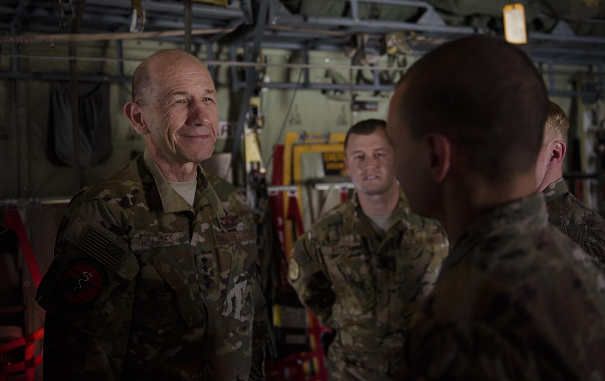 Gen. Mike Holmes, commander of Air Combat Command, speaks with an Airman 1st Class Edward Wobensmith, 455th Expeditionary Aircraft Maintenance Squadron, at Bagram Airfield, Afghanistan, May 25, 2017. Holmes visited Bagram Airfield to speak with Airmen and Soldiers, and to see firsthand the multiple ways Airmen project airpower in the region. (U.S. Air Force photo by Staff Sgt. Benjamin Gonsier)