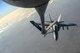 A U.S. Navy F/A-18C from the Strike Fighter Squadron VFA-37 Ragin' Bulls receives fuel in flight from a U.S. Air Force KC-135 Stratotanker over Southwest Asia May 21, 2017. Assigned to the 340th Expeditionary Air Refueling Squadron, out of Al Udeid Air Base, Qatar, the tanker from the 186th Air Refueling Wing, Mississippi Air National Guard was fitted with a drogue attached to the boom, for specialized receiver equipment on Navy and coalition aircraft. The 340th EARS maintains a 24/7 presence in the AOR, extending the missions of aircraft supporting Operation Inherent Resolve and the fight against ISIS. (U.S. Air National Guard photo by Master Sgt. Andrew J. Moseley/Released)