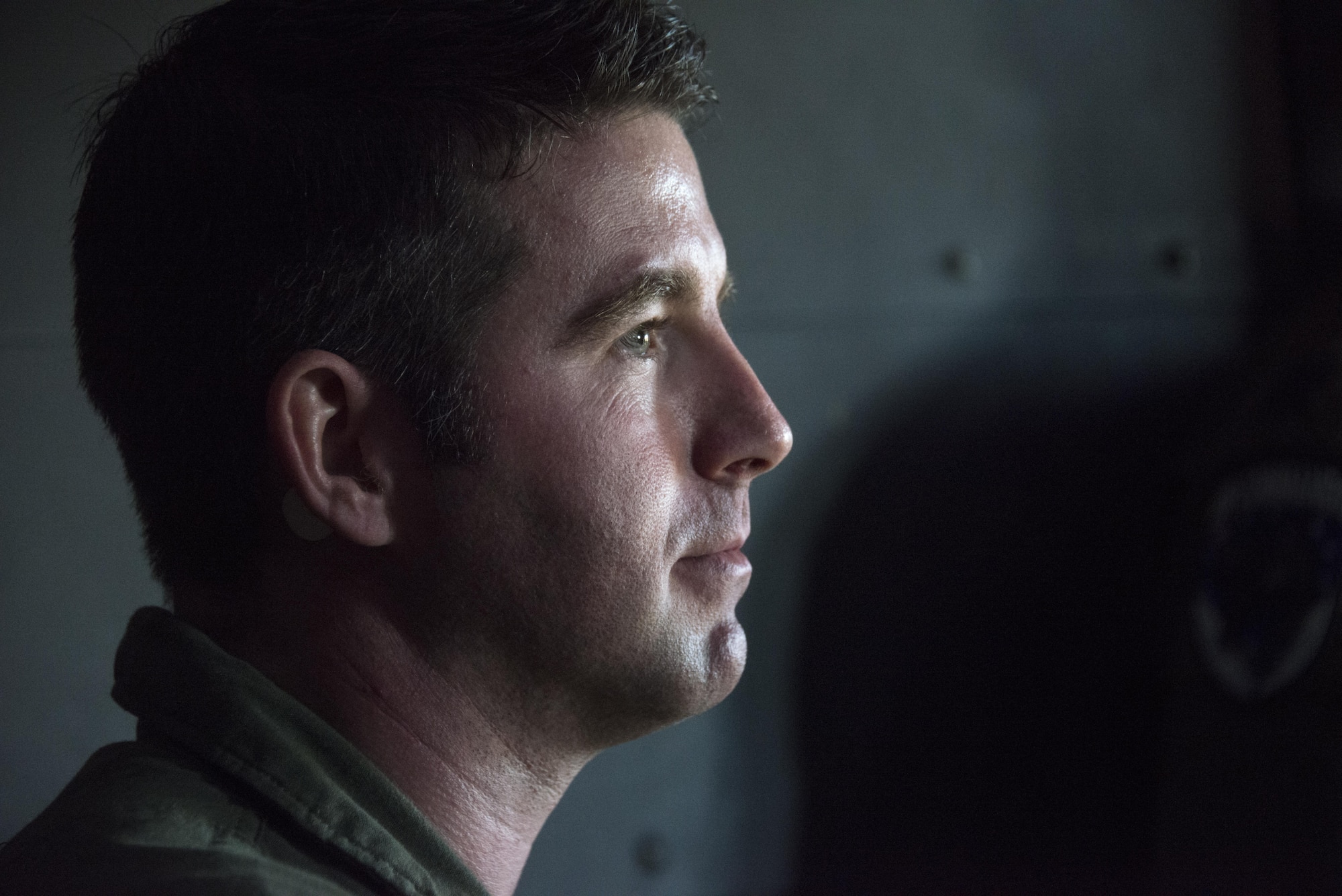 A U.S. Air Force Special Operations Forces Medical Element (SOFME) medic listens to the pre-flight briefing prior to a casualty evacuation (CASEVAC) exercise, April 26, 2017 at Royal New Zealand Air Force Base Woodbourne, New Zealand. Following 2-weeks of subject-matter expert exchanges, the SOFME and RNZAF medics executed a CASEVAC from a U.S. Air Force MC-130H Combat Talon II assigned to the 1st Special Operations Squadron. (U.S. Air Force photo by Capt. Jessica Tait)