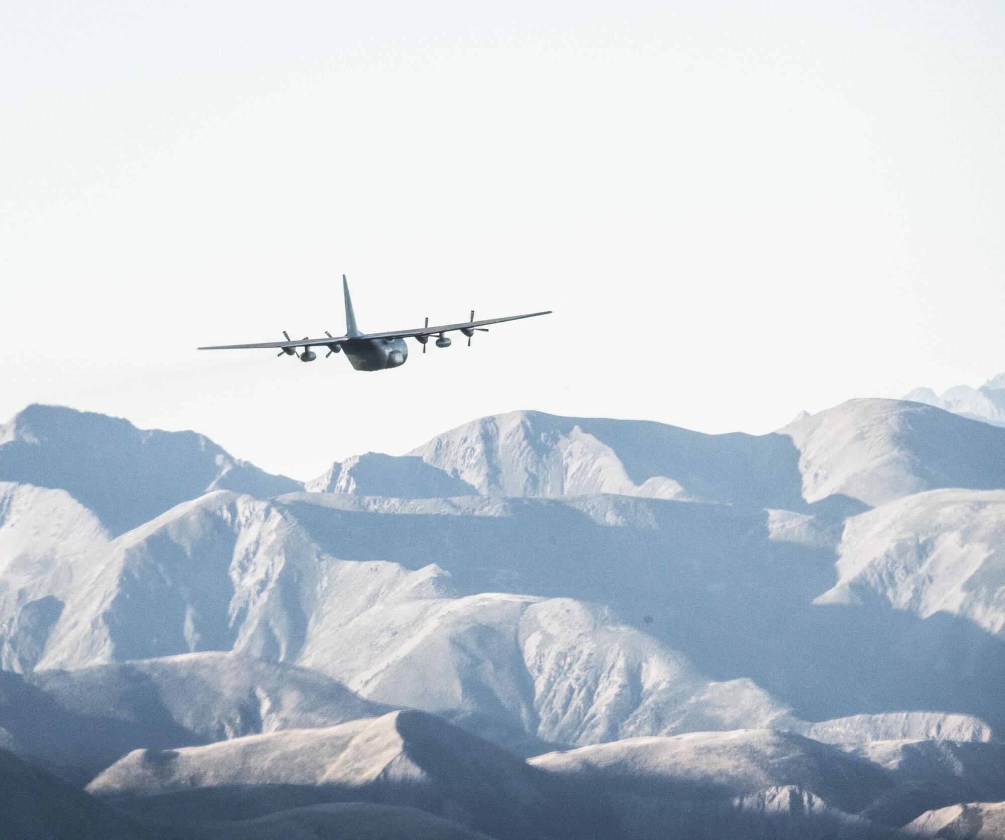 A Royal New Zealand Air Force 40th Squadron C-130 flies in formation with a U.S. Air Force 1st Special Operations Squadron MC-130H Combat Talon II, April 22, 2017 at Royal New Zealand Air Force Base Woodbourne, New Zealand. The combined mission demonstrated the strength of the alliance between the United States and New Zealand. (U.S. Air Force photo by Capt. Jessica Tait)