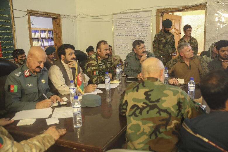 Brig. Gen. Chakansori, left, Brig. Gen. Ahmadzai, center, and U.S. Marine Brig. Gen. Roger Turner, right, gather with the Helmand provincial governor during a shura at Camp Nolay near the Sangin district of Helmand, Afghanistan May 25, 2017. The shura concluded an expeditionary advising package held by U.S. Marine advisors with Task Force Southwest and Afghan National Army soldiers with the 2nd Brigade, 215th Corps, which addressed force sustainment procedures and facilitated a clearing operation conducted by 3rd Kandak, 2nd Brigade. Chakansori, Ahmadzai, and Turner are the commanding generals of the 505th Zone National Police, 215th Corps, and Task Force Southwest, respectively. (U.S. Marine Corps photo by Sgt. Lucas Hopkins)