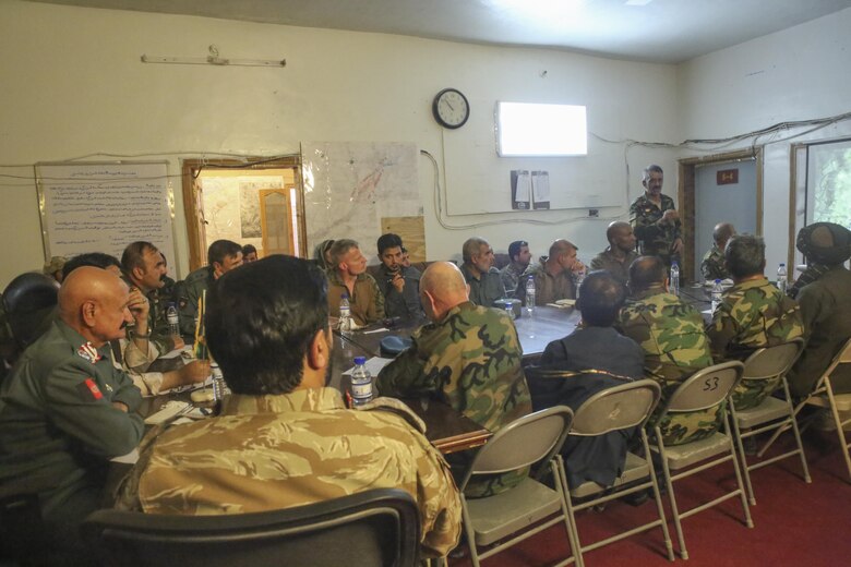 Afghan National Army Col. Abdul Waheid Tamurei, right, the commanding officer of 2nd Brigade, 215th Corps, speaks during a shura at Camp Nolay near the Sangin district of Helmand, Afghanistan May 25, 2017. The Helmand provincial governor met with key leaders from the 505th Zone National Police, Afghan National Army 215th Corps and Task Force Southwest to discuss the governance and security posture in Sangin and other districts throughout Helmand. (U.S. Marine Corps photo by Sgt. Lucas Hopkins)