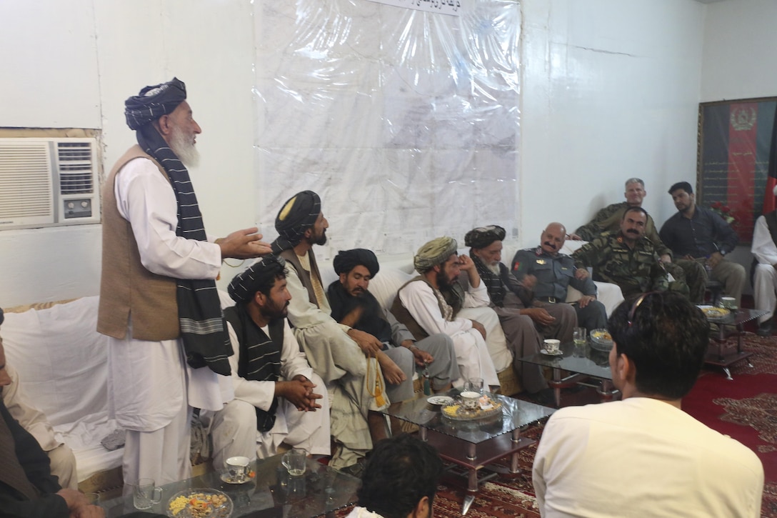 An Afghan tribal elder speaks to key leaders with the 505th Zone National Police, Afghan National Army 215th Corps and Task Force Southwest during a shura at Camp Nolay near the Sangin district of Helmand, Afghanistan May 25, 2017. The shura concluded an expeditionary advising package led by U.S. Marine advisors with Task Force Southwest and Afghan National Army soldiers with the 2nd Brigade, 215th Corps, which addressed force sustainment procedures and facilitated a clearing operation conducted by 3rd Kandak, 2nd Brigade. (U.S. Marine Corps photo by Sgt. Lucas Hopkins)