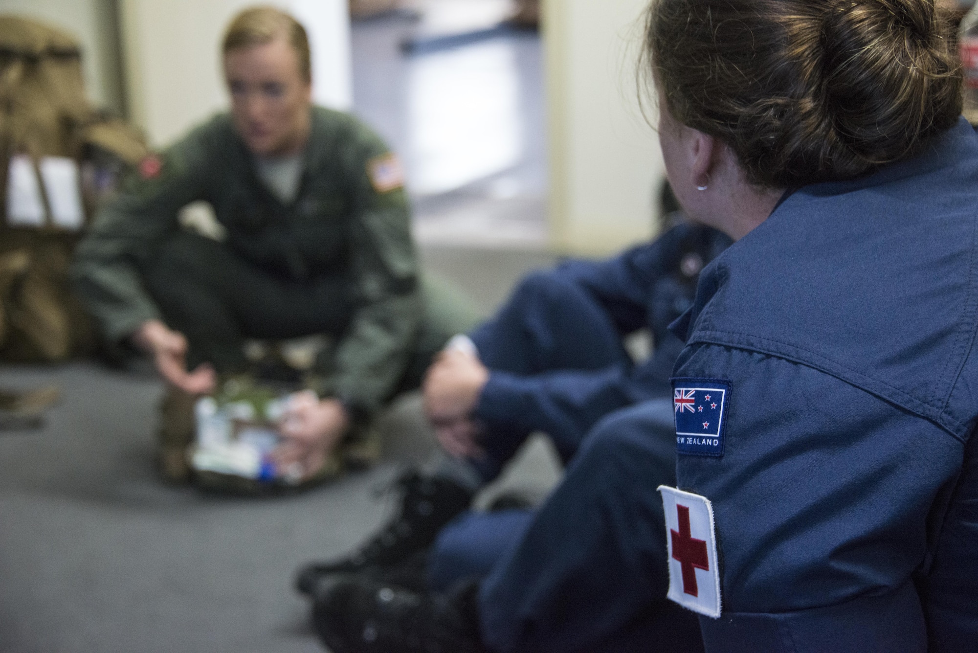 A U.S. Air Force Special Operations Forces Medical Element (SOFME) medic demonstrates the equipment she uses during an exchange with Royal New Zealand Air Force medics, April 26, 2017 at RNZAF Base Woodbourne, New Zealand. The main objective of the medical exchange was to work closely with RNZAF partners, share experiences and exchange tactics, training and procedures. (U.S. Air Force photo by Capt. Jessica Tait)