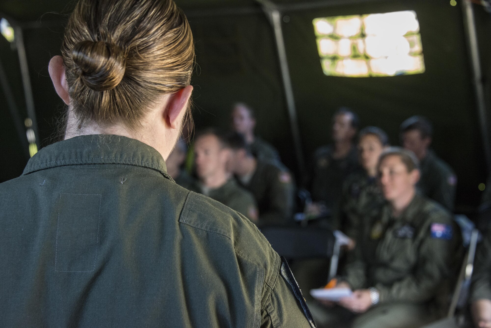 A U.S. Air Force 1st Special Operations Squadron crew commander delivers a mission briefing to Royal New Zealand Air Force 40th Squadron and 1st SOS aircrew prior to formation flying operations, April 27, 2017 at RNZAF Base Woodbourne, New Zealand. The combined mission involving a formation flight with two U.S. Air Force MC-130s and one RNZAF C-130 demonstrated the strength of the alliance between the United States and New Zealand (U.S. Air Force photo by Capt. Jessica Tait)