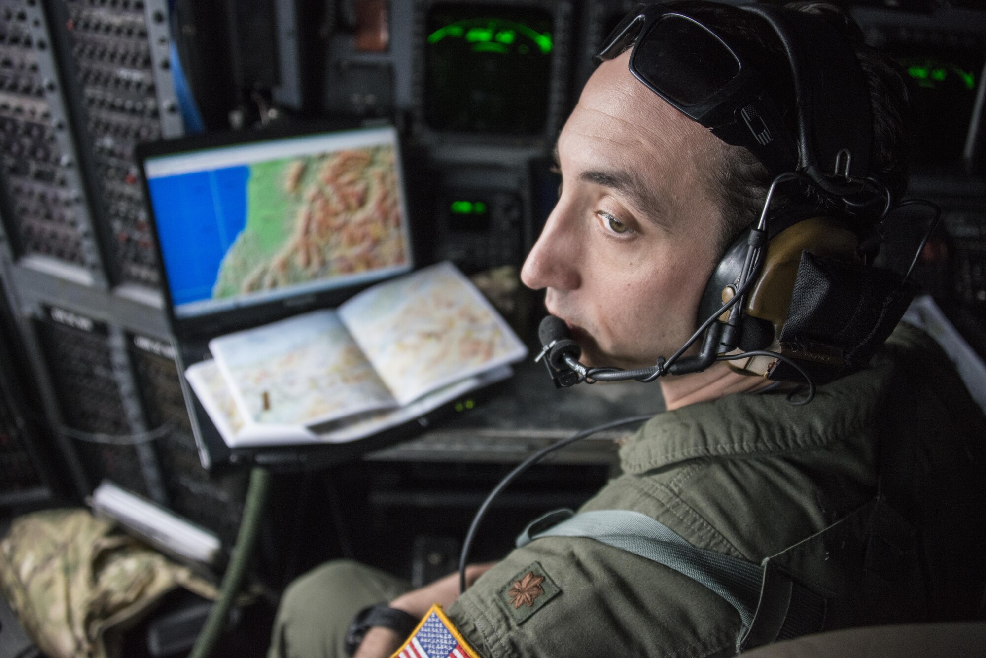 A U.S. Air Force 1st Special Operations Squadron navigator demonstrates flying operations from a U.S. Air Force MC-130H Combat Talon II during an observation flight with U.S. Embassy New Zealand staffers, April 19, 2017 at Royal New Zealand Air Force Base Woodbourne, New Zealand. During the visit, U.S. Embassy staffers learned about the MC-130’s specialized equipment and extensive training that goes with it. (U.S. Air Force photo by Capt. Jessica Tait)