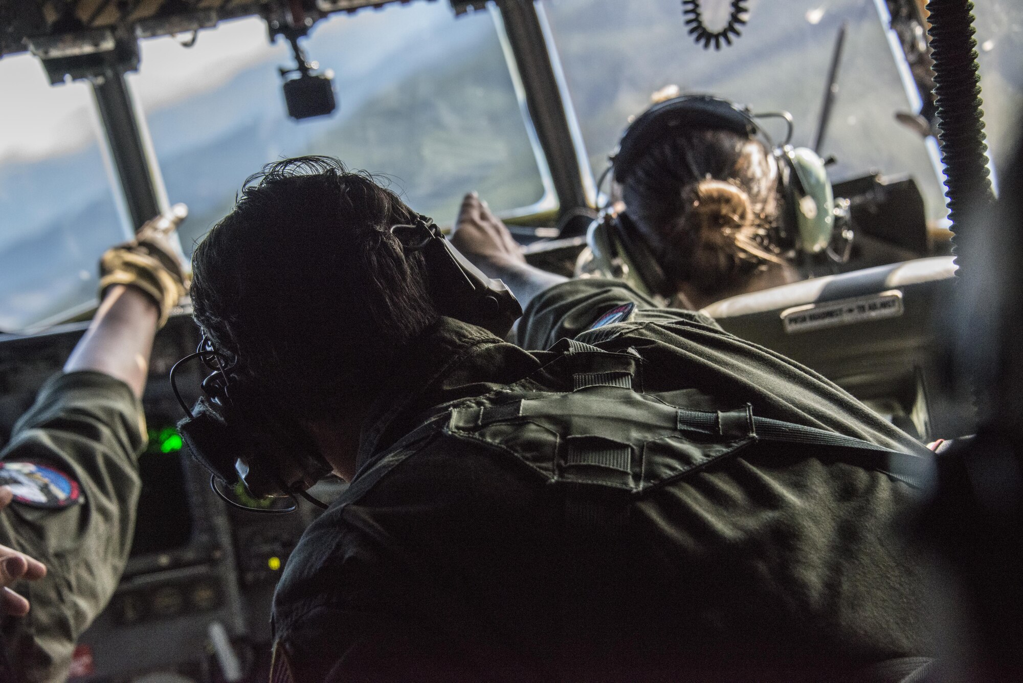 A U.S. Air Force 1st Special Operations Squadron flight engineer demonstrates flying operations from a U.S. Air Force MC-130H Combat Talon II during an observation flight with U.S. Embassy New Zealand staffers, April 19, 2017 at Royal New Zealand Air Force Base Woodbourne, New Zealand. During the visit, U.S. Embassy staffers learned about the MC-130’s specialized equipment and extensive training that goes with it. (U.S. Air Force photo by Capt. Jessica Tait)