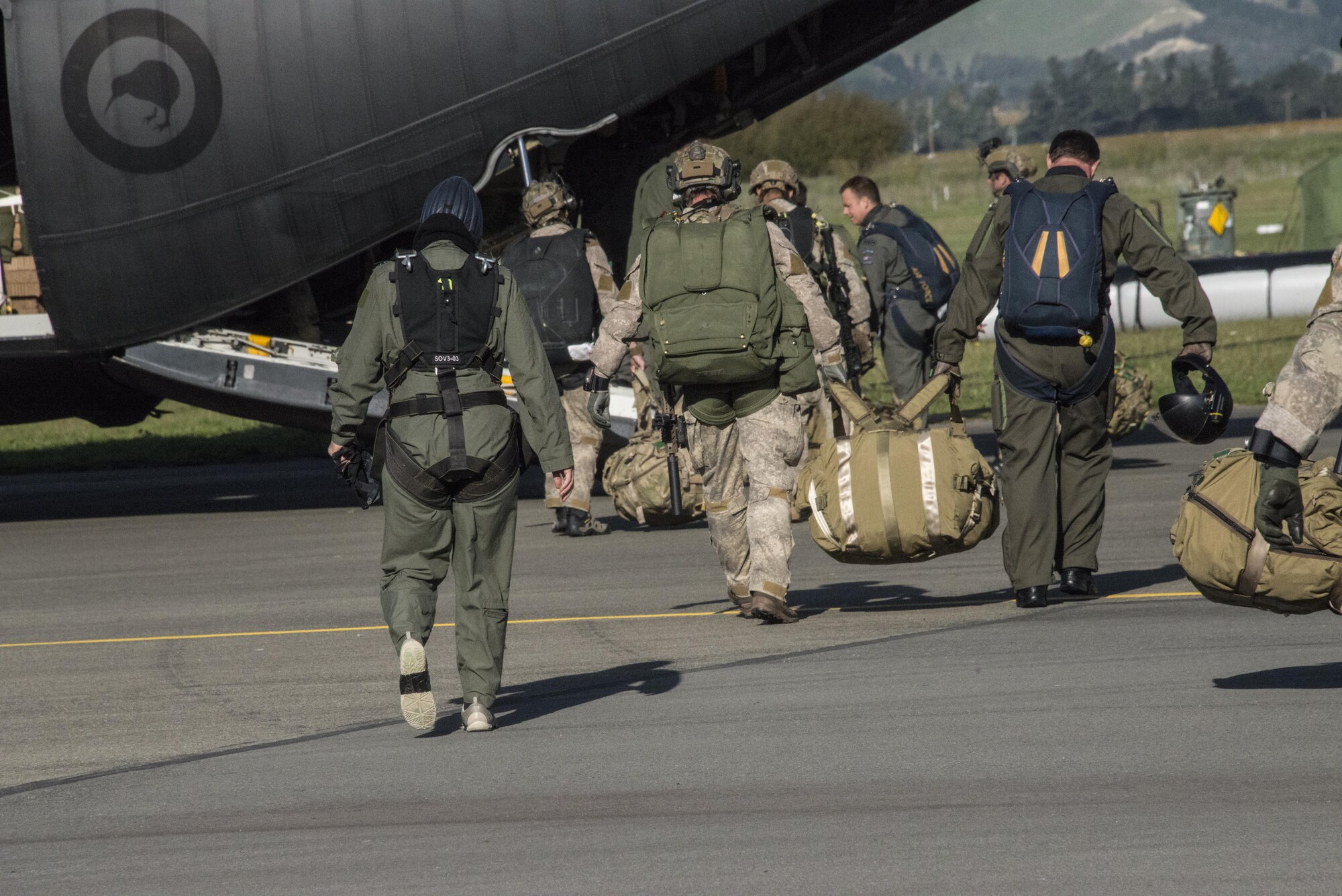 Ms. Candy Green, U.S. Embassy New Zealand’s Chargé d'Affaires, prepares to board a Royal New Zealand Air Force C-130 prior to parachute operations, April 20, 2017 at RNZAF Base Woodbourne, New Zealand. Members of the 353rd Special Operations Group and RNZAF 40th Squadron showcased the military cooperation efforts between the U.S. and New Zealand militaries during a U.S. Embassy visit. (U.S. Air Force photo by Capt. Jessica Tait)