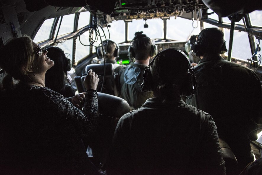 U.S. Embassy New Zealand staffers enjoy the view from the cockpit of an U.S. Air Force MC-130H Combat Talon II assigned to the 1st Special Operations Squadron during an observation flight, April 19, 2017 at Royal New Zealand Air Force Base Woodbourne, New Zealand. U.S. Embassy staffers came down during Exercise Teak Net to observe first-hand the training being conducted with RNZAF partners. (U.S. Air Force photo by Capt. Jessica Tait)