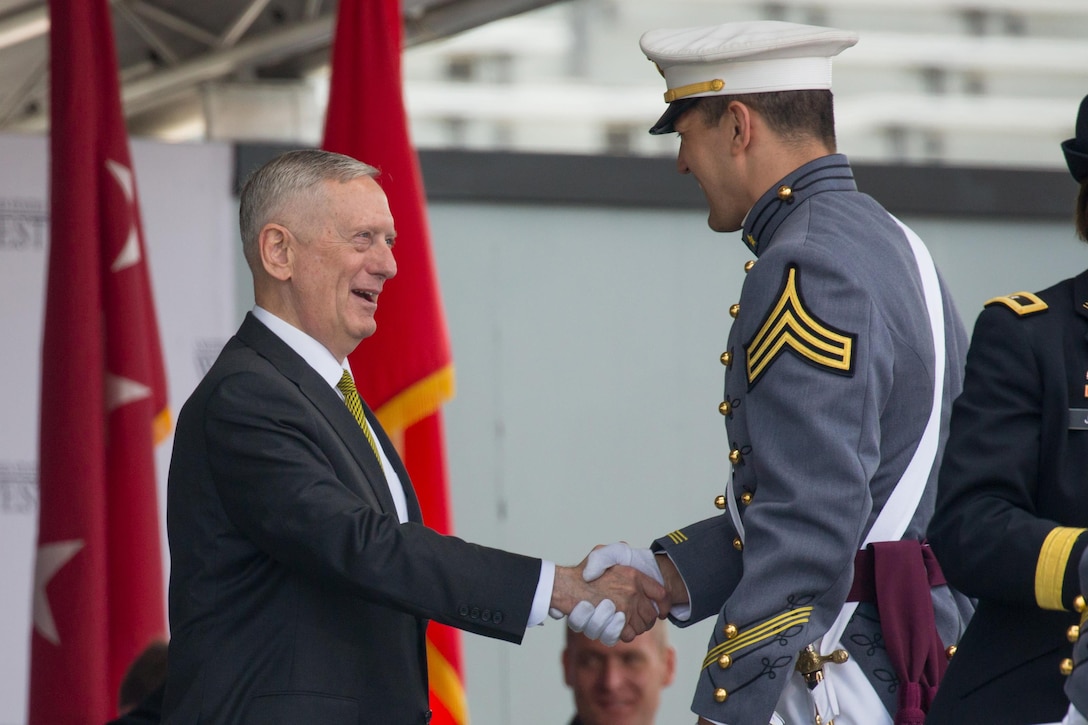 Defense Secretary Jim Mattis congratulates a cadet during the commencement ceremony for the U.S. Military Academy Class of 2017 at West Point, N.Y., May 27, 2017. Nine hundred thirty-six cadets from the class received their diplomas during the ceremony. Army photo by Staff Sgt. Vito T. Bryant