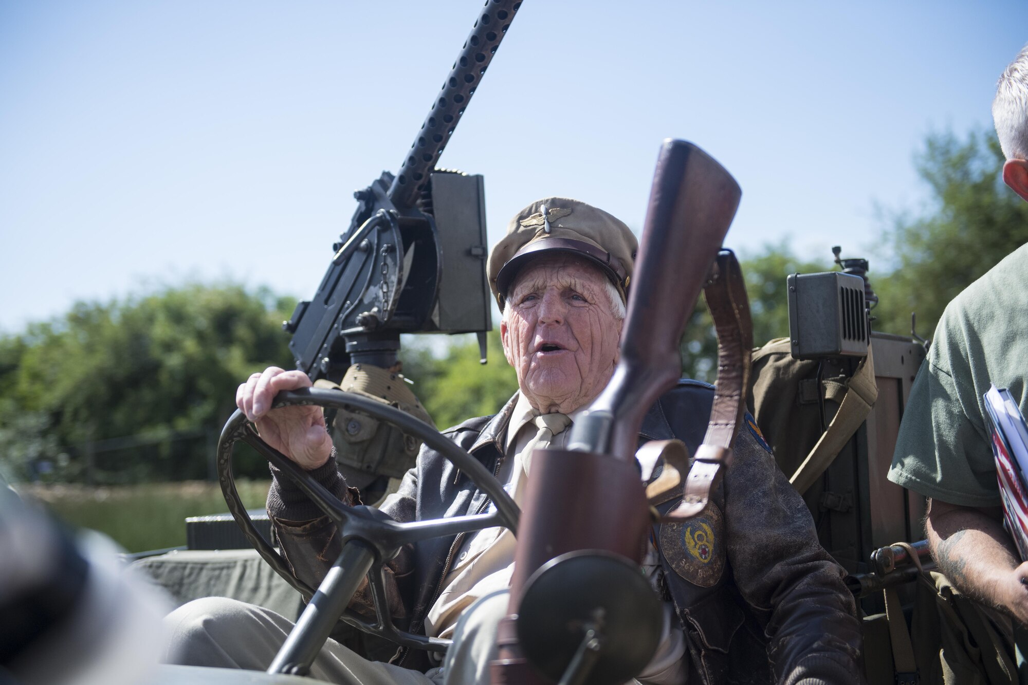 Douglas Ward, 305th Bombardment Group veteran, laughs at a joke made during a tour of the airfield he served at in Chelveston England, May 27. Ward visited the airfield for the first time since he served there 75 years earlier. (U.S. Air Force photo by Senior Airman Joshua King)