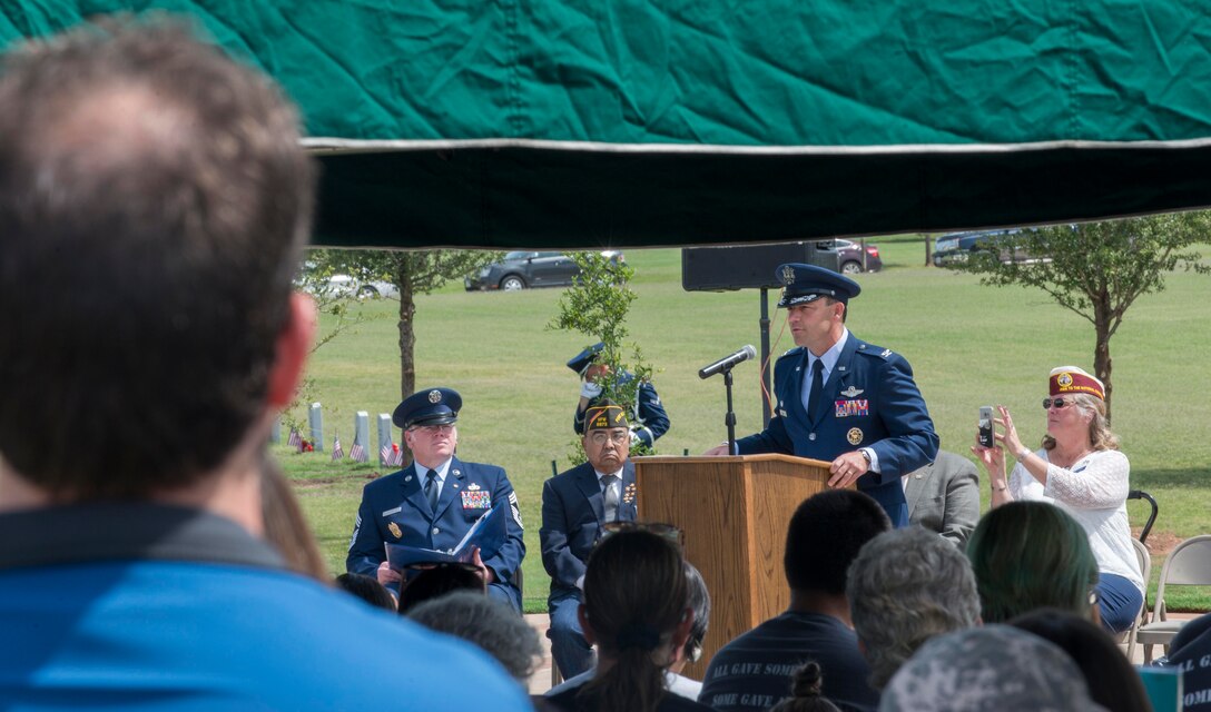 U.S. Air Force Col. David Benson, 7th Bomb Wing commander, gives his remarks at the Memorial Day Tribute at the Texas State Veterans Cemetery, Abilene, Texas, May 29, 2017. Dyess Airmen and Abilene residents came out to pay their respects for the fallen military members. (U.S. Air Force photo by Senior Airman Austin Mayfield)