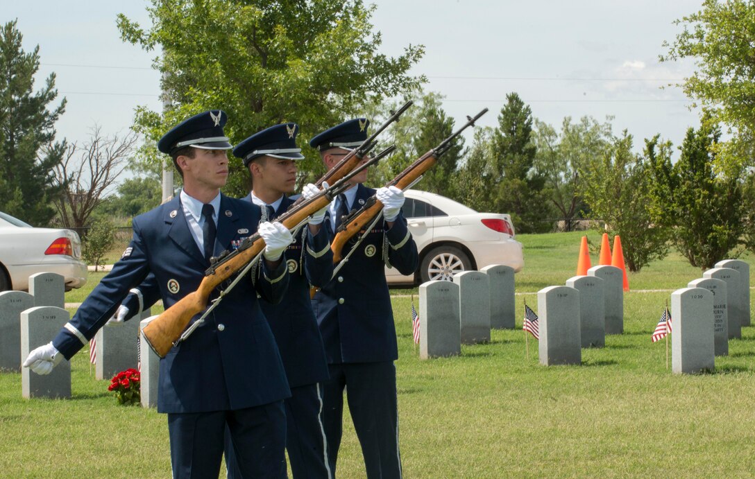 Members from the Dyess Air Force Base Honor Guard preform a firing party at the Texas State Veterans Cemetery, Abilene, Texas, May 29, 2017. The firing party is used to honor fallen service members by firing 3 volleys into the air over the service member’s head. (U.S. Air Force photo by Senior Airman Austin Mayfield)