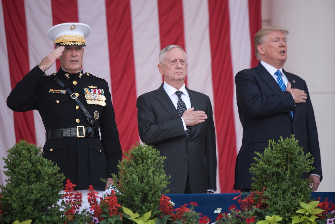 President Donald J. Trump, right, Defense Secretary Jim Mattis and Marine Corps Gen. Joe Dunford, chairman of the Joint Chiefs of Staff, render honors during the 149th annual DoD National Memorial Day Observance at Arlington National Cemetery in Virginia, May 29, 2017. DoD Photo by Army Sgt. James K. McCann