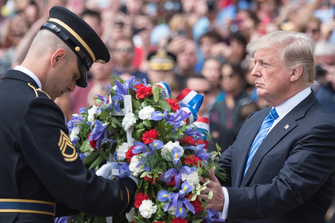 President Donald J. Trump lays a wreath at the Tomb of the Unknowns at Arlington National Cemetery in Arlington, Va.