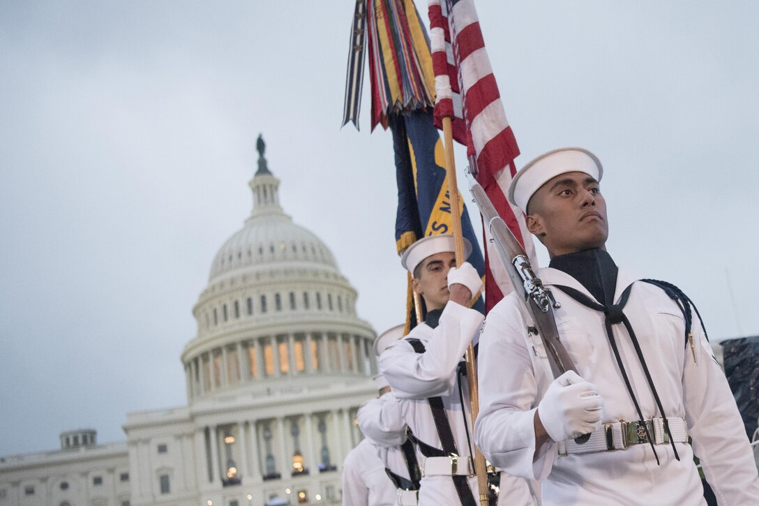 The U.S. Navy Ceremonial Guard parades the colors during the National Memorial Day concert