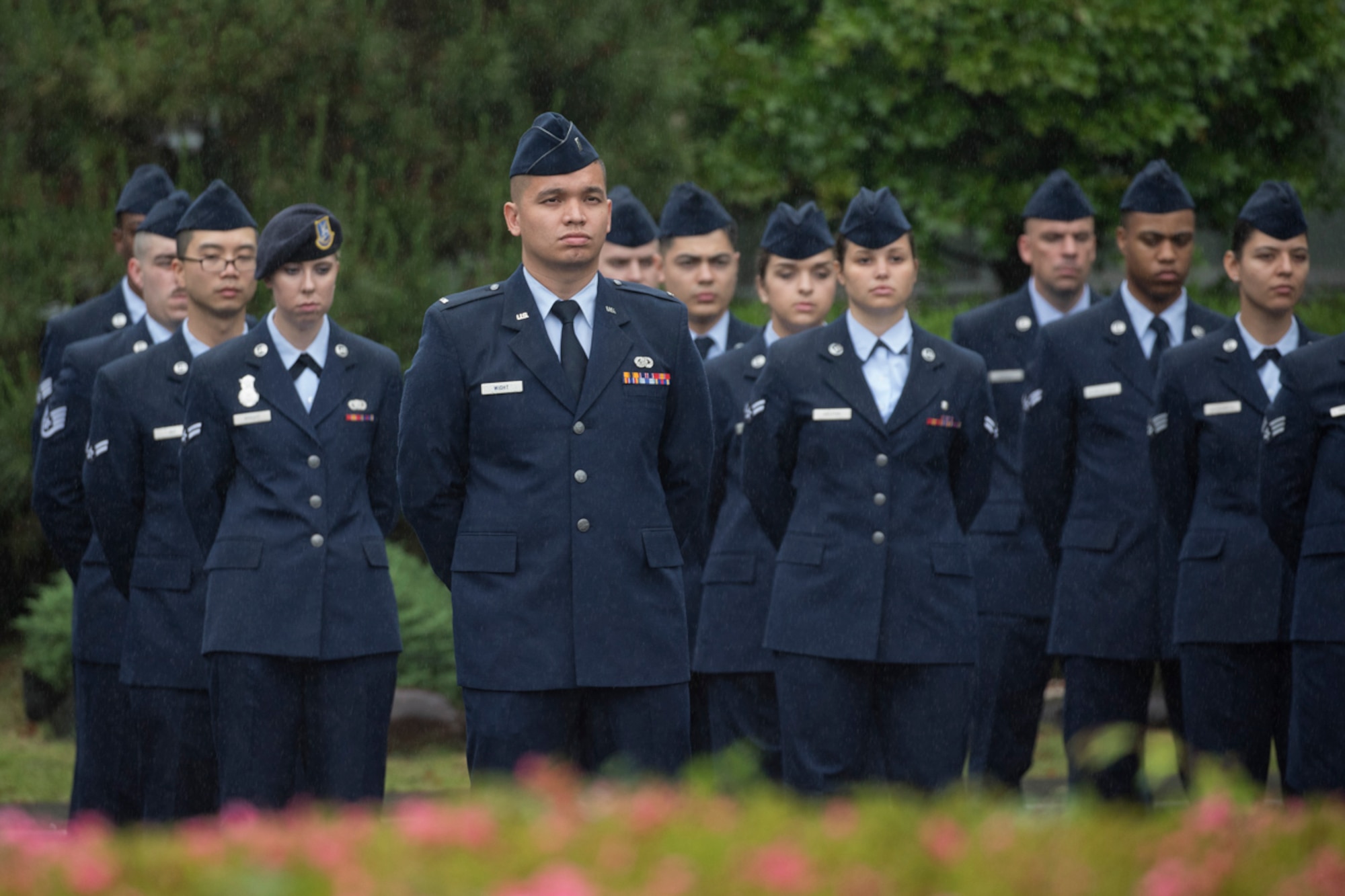 Yokota airmen stand in formation during the Memorial Day ceremony at Yokota Air Base, Japan, May 26, 2017. The 374th Airlift Wing hosted the ceremony in memory of those who made the ultimate sacrifice during military service. (U.S. Air Force photo by Yasuo Osakabe)