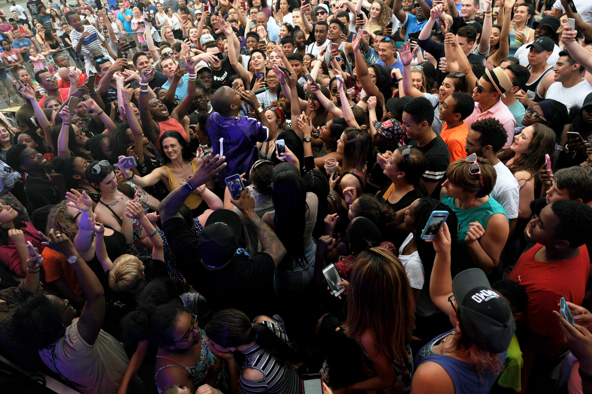 B.o.B, rapper and music producer, interacts with the audience during a performance at Ramstein Air Base, Germany, May 28, 2017. The free concert was provided by Navy Entertainment and Armed Forces Entertainment. (U.S. Air Force photo/Tech. Sgt. Sharida Jackson)