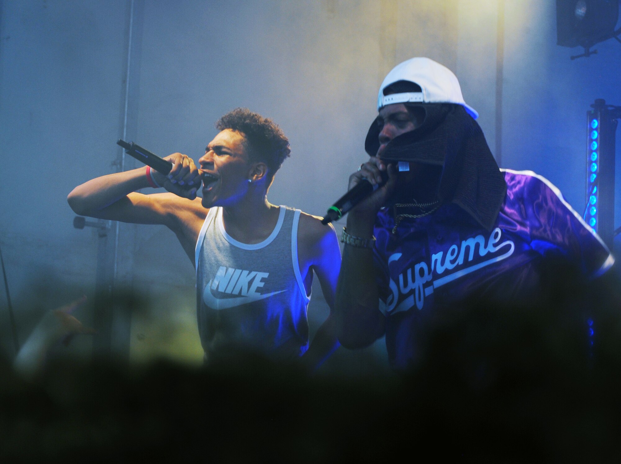 Asiah Shannon, left, son of Tech. Sgt. Kristina Shannon, 86th Communications Squadron postmaster, performs with rapper and music producer B.o.B during a free concert at Ramstein Air Base, Germany, May 28, 2017. The musical artist picked Shannon from the audience and invited him to perform a song. (U.S. Air Force photo/Tech. Sgt. Sharida Jackson)