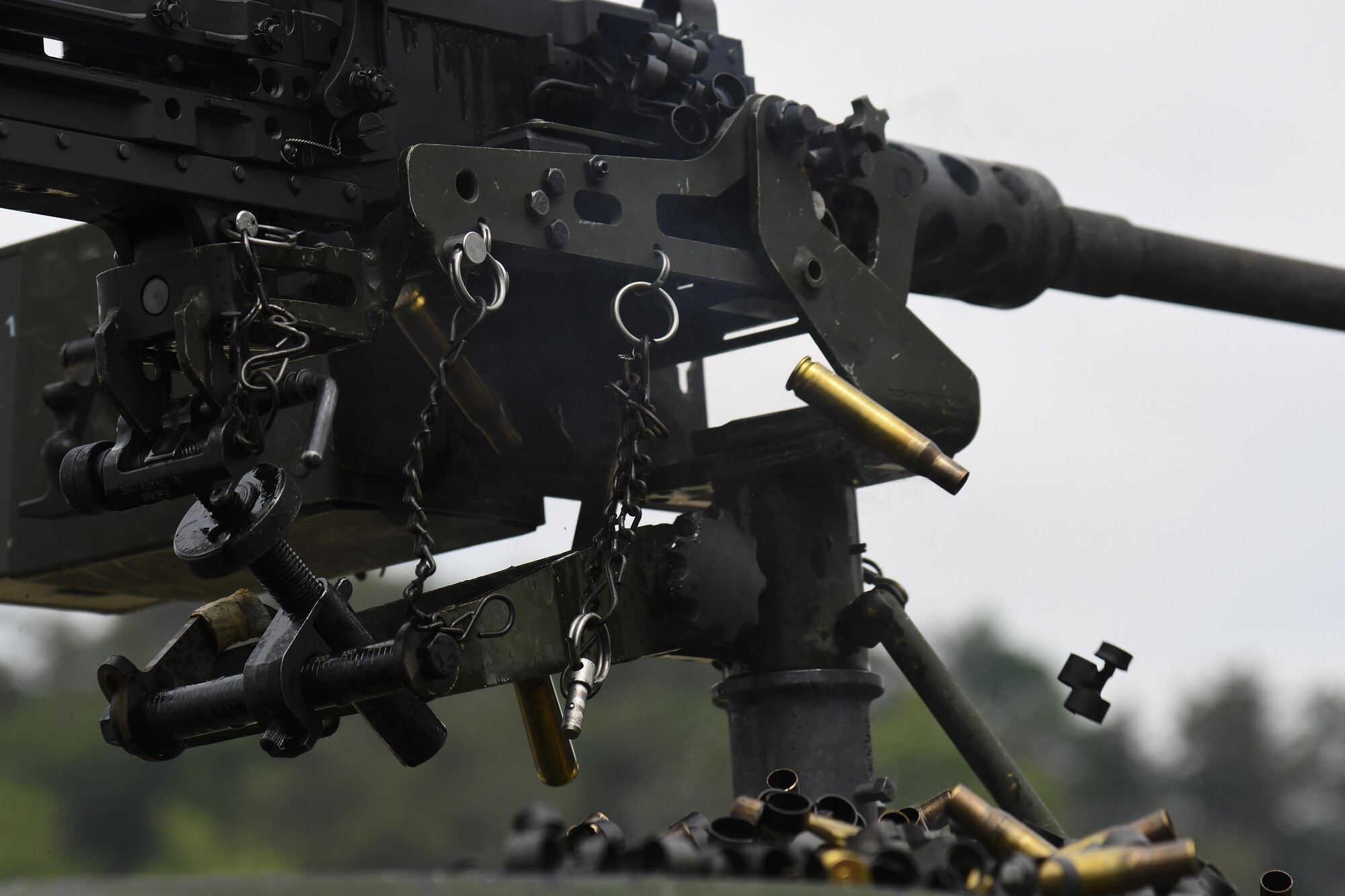 Casings from a M2 machine gun are released during weapons firing at Camp Rodriguez, Republic of Korea, May 23, 2017. This training ensures that defenders are vigilant and ready to ‘Fight Tonight.’ (U.S. Air Force photo by Airman 1st Class Gwendalyn Smith)