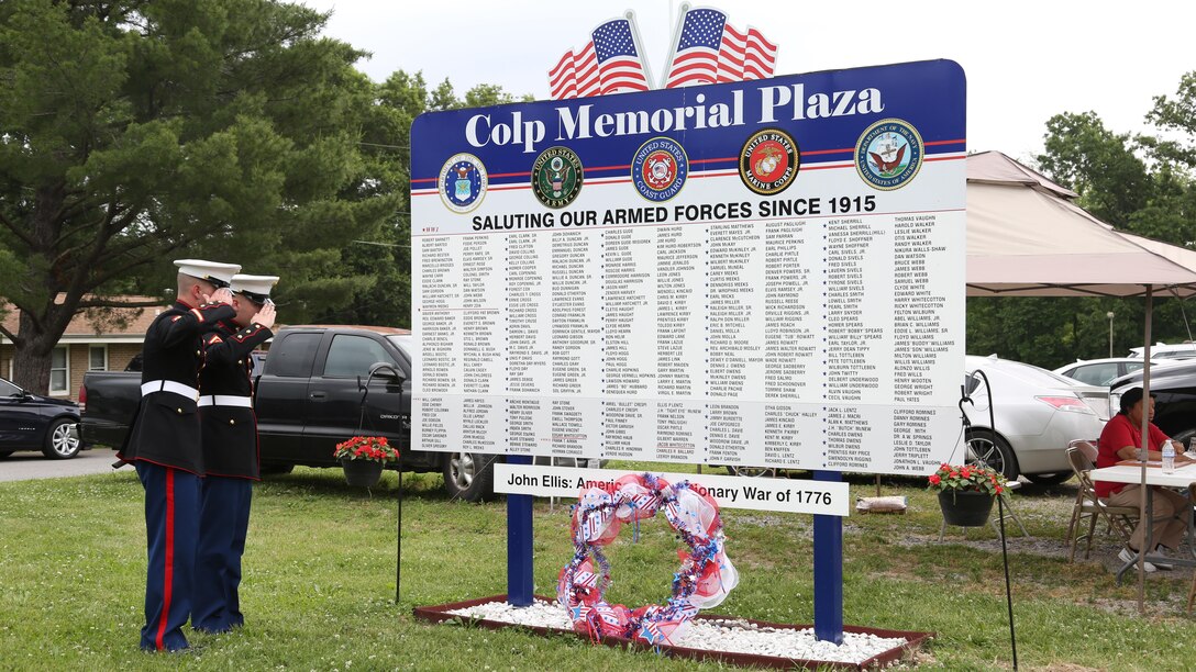 Sergeant Mike Stachowski greets Archibald Mosley, May 27, at the Colp Area Veterans Celebration, Dedication and Remembrance Ceremony, in Colp, Illinois. The ceremony honored fallen service members, Mosley and three other African American Marines from Colp, who were among the first black Americans to join Marine Corps during World War II. They became known as the Montford Point Marines. Nearly 20,000 African-Americans joined the Marine Corps in 1942, after President Franklin D. Roosevelt issued a “presidential directive giving African Americans an opportunity to be recruited in the Marine Corps,” according to the Montford Point Marines Association website. They didn’t receive recruit training at San Diego or Parris Island, however, but Camp Montford Point, N.C., a segregated training site for African American Marine recruits. For the next seven years, the camp remained opened until it became desegregated. The four Marines are Sol Griffin, Jr.; James L. Kirby, Early Taylor, Jr. and Archibald Mosley. These Marines, among many other Montford Point Marines across the country, were awarded the Congressional Gold Medal, the highest award that can be given to a civilian by Congress, in 2012. 