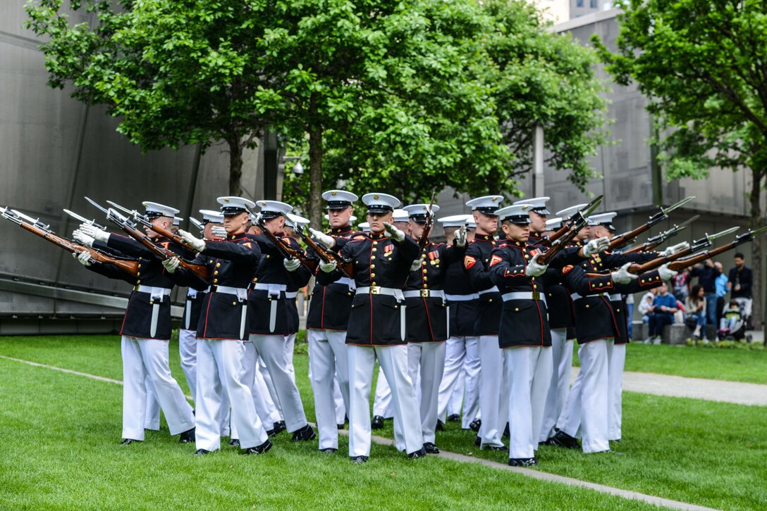 The Marine Corps Silent Drill Platoon performed for a crowd at the 9/11 Memorial Plaza in New York following the 2017 Freedom Run, May 28, 2017. Marines, Sailors, and Coast Guardsmen participated in the run to honor the lives lost in the 9/11 terrorist attacks. 