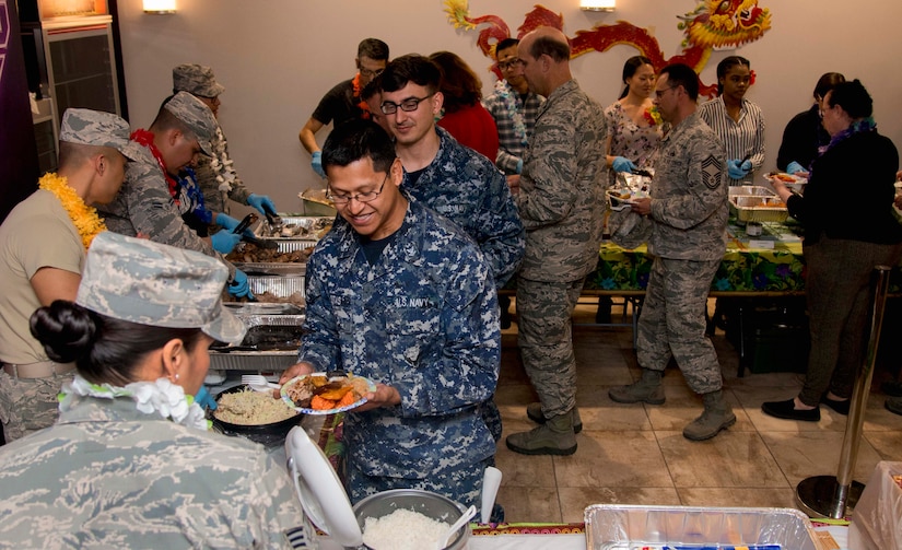 Base members attend the Asian American and Pacific Islander Heritage Month Culture Show at Joint Base Andrews, Md., May 24, 2017. Event attendees got the opportunity to learn about and taste dishes from Guam, Philippines, India and Japan.  (U.S. Air Force photo by Airman 1st Class Valentina Lopez)