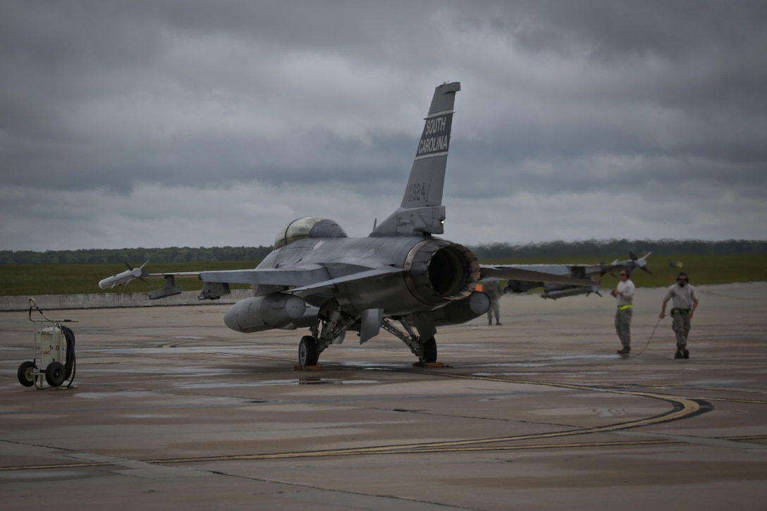 A South Carolina Air National Guard F-16D Fighting Falcon from the 169th Fighter Wing is prepped for a mission during a three-day Aeropsace Control Alert CrossTell live-fly training exercise at Atlantic City Air National Guard Base, N.J., May 24, 2017. Representatives from the Air National Guard fighter wings, Civil Air Patrol, and U.S. Coast Guard rotary-wing air intercept units will conduct daily sorties from May 23-25 to hone their skills with tactical-level air-intercept procedures. (U.S. Air National Guard photo by Master Sgt. Matt Hecht/Released)