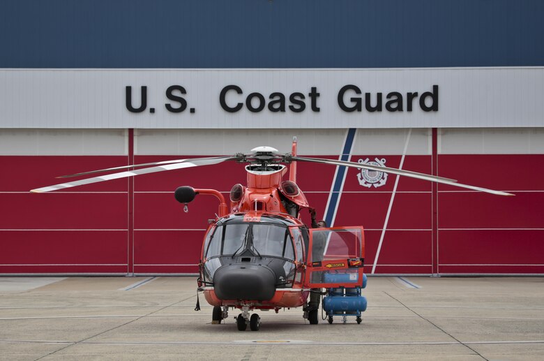 A U.S. Coast Guard HH-65C Dolphin helicopter from Coast Guard Air Station Atlantic City is prepared for a mission during a three-day Aeropsace Control Alert CrossTell live-fly training exercise at Atlantic City International Airport, N.J., May 24, 2017. Representatives from the Air National Guard fighter wings, Civil Air Patrol, and U.S. Coast Guard rotary-wing air intercept units will conduct daily sorties from May 23-25 to hone their skills with tactical-level air-intercept procedures. (U.S. Air National Guard photo by Master Sgt. Matt Hecht/Released)