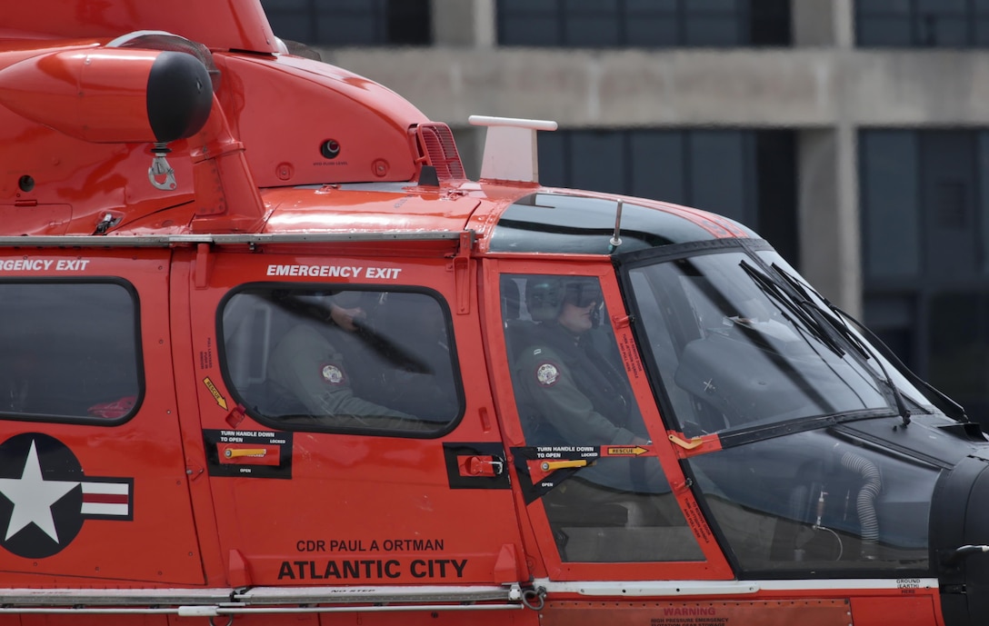A U.S. Coast Guard HH-65C Dolphin helicopter from Coast Guard Air Station Atlantic City takes off during a three-day Aeropsace Control Alert CrossTell live-fly training exercise at Atlantic City International Airport, N.J., May 24, 2017. Representatives from the Air National Guard fighter wings, Civil Air Patrol, and U.S. Coast Guard rotary-wing air intercept units will conduct daily sorties from May 23-25 to hone their skills with tactical-level air-intercept procedures. (U.S. Air National Guard photo by Master Sgt. Matt Hecht/Released)