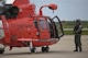 A U.S. Coast Guard HH-65C Dolphin crew chief from Coast Guard Air Station Atlantic City preps the aircraft for takeoff after an alert during a three-day Aeropsace Control Alert CrossTell live-fly training exercise at Atlantic City International Airport, N.J., May 24, 2017. Representatives from the Air National Guard fighter wings, Civil Air Patrol, and U.S. Coast Guard rotary-wing air intercept units will conduct daily sorties from May 23-25 to hone their skills with tactical-level air-intercept procedures. (U.S. Air National Guard photo by Master Sgt. Matt Hecht/Released)