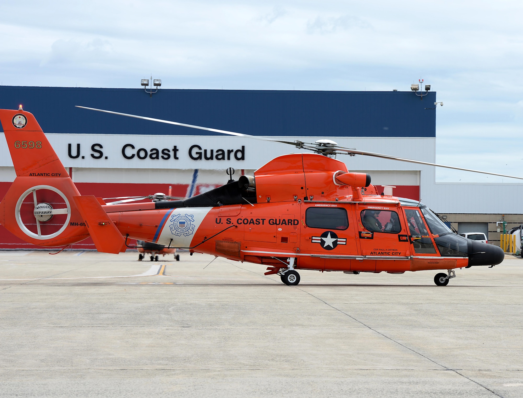 A U.S. Coast Guard HH-65C Dolphin Helicopter prepares to take off for an alert during a Cross Tell training exercise at the Atlantic City International Airport, N.J., May 24, 2017. Air National units from New Jersey, South Carolina and Washington D.C. participated in training and familiarization exercises with the U.S. Coast Guard and Civil Air Patrol during the three-day CrossTell to increase awareness of the Aerospace Control Alert mission. (U.S. Air National Guard photo by Airman 1st Class Cristina J. Allen/Released)