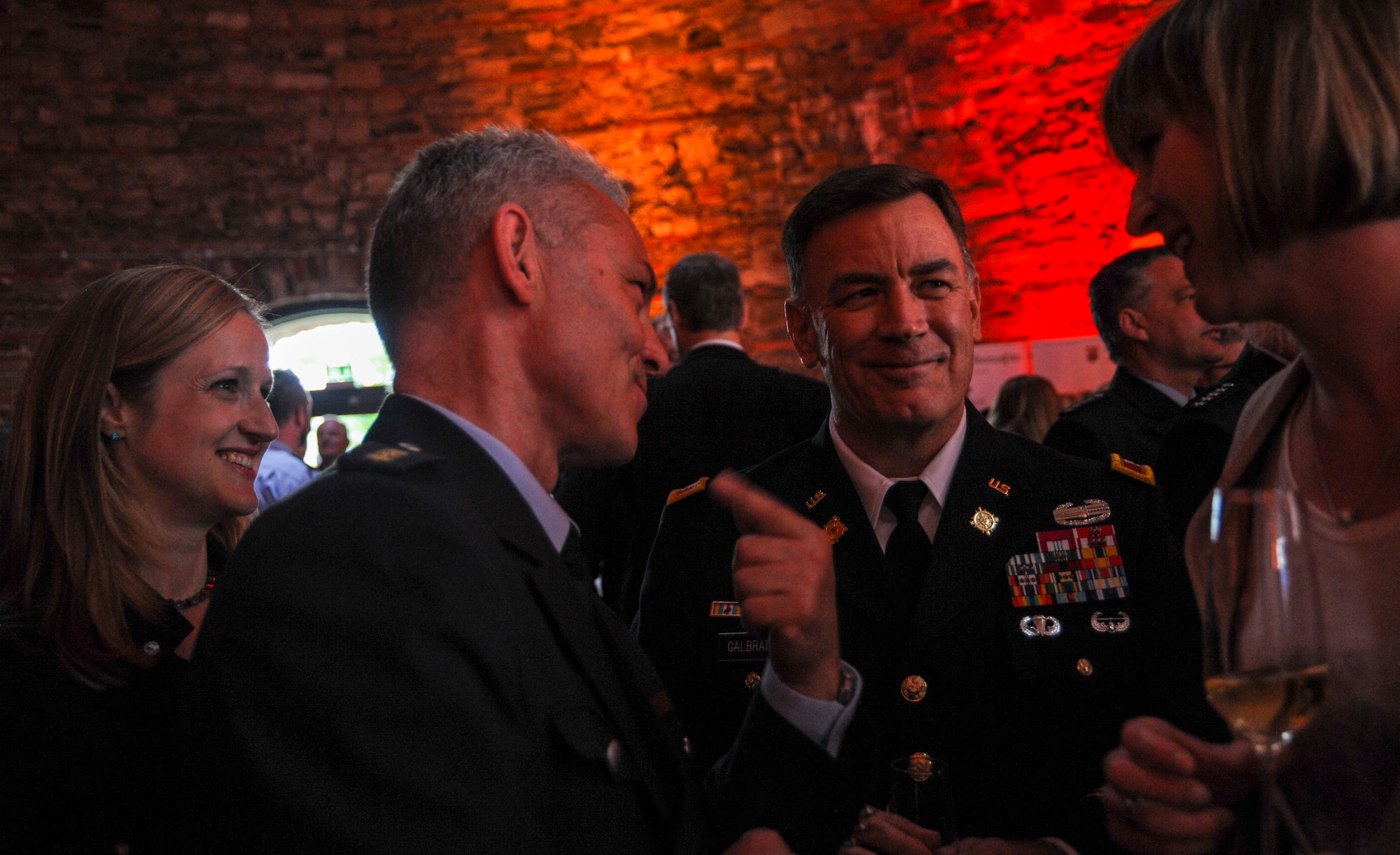 U.S. Army Col. William S. Galbraith, center, 21st Theater Sustainment Command deputy commanding officer, speaks with a German police officer at the Rhineland-Palatinate Polizei’s 70th year anniversary celebration in Koblenz, Germany, May 20, 2017. Galbraith and other members of the Kaiserslautern Military Community were invited to the celebration as the Polizei often work alongside U.S. Air Force and Army security police. (U.S. Air Force photo by Staff Sgt. Timothy Moore)