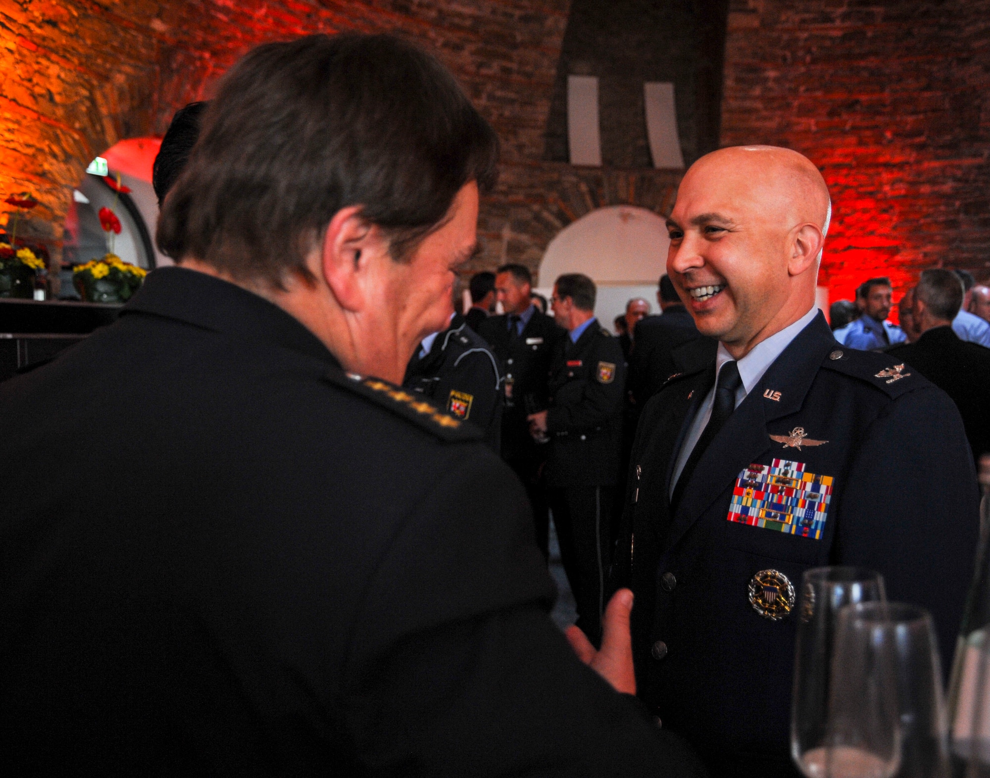 U.S. Air Force Col. Curtis G. Juell, right, 86th Mission Support Group commander, speaks with a German police officer at the Rhineland-Palatinate Polizei’s 70th year anniversary celebration in Koblenz, Germany, May 20, 2017. Galbraith and other members of the Kaiserslautern Military Community were invited to the celebration as the Polizei often work alongside U.S. Air Force and Army security police. (U.S. Air Force photo by Staff Sgt. Timothy Moore)