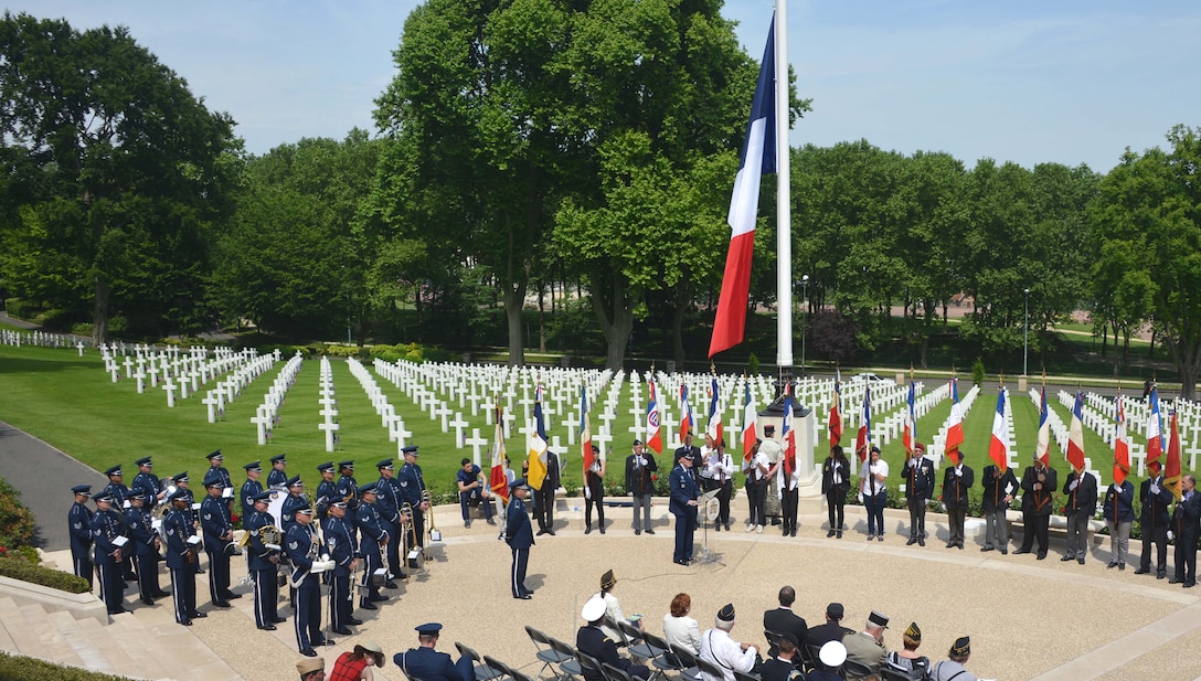 Air Force Gen. Tod D. Wolters, center, commander of U.S. Air Forces in Europe and Air Forces Africa, speaks at a Memorial Day ceremony at the American cemetery in Suresnes, France, May 28, 2017. This Memorial Day marks the centennial of U.S. entry into World War I. Air Force photo by Capt. Ben Sowers