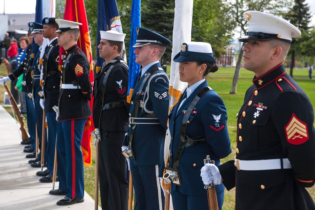 The Joint Base Elmendorf-Richardson's Color Guard prepares to present the colors during a Memorial Day Ceremony at Delaney Park Strip in Anchorage, Alaska, May 29, 2017. Air Force photo by Staff Sgt. James Richardson