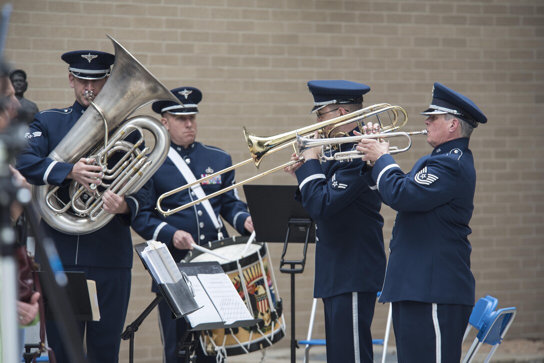 The U.S. Air Force Band of Flight performs at the 2017 Legacy Data Plate Wall of Honor Tribute Ceremony held at the National Museum of the U.S. Air Force on May 25, 2017. Traditionally, all military aircraft have a data plate, which identifies the builder, and includes the aircraft model designation, serial number, and other important information. These Legacy Data Plates extend this tradition as a means to recognize and honor individuals.(U.S. Air Force photo by Ken LaRock)