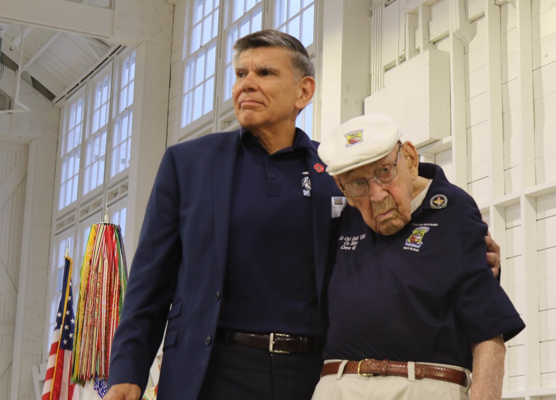 U.S. Marine Corps Maj. Gen. (Ret.) Juan Ayala (left) and U.S. Army Air Force Lt. Col. (Ret.) Richard E. Cole (right)  on Saturday, May 20, 2017 at a World War I commemoration event at Hangar 9 of Brooks City Base in San Antonio, Texas. The event was hosted by the City of San Antonio Department of Military Affairs to honor those who served in World War I. (U.S. Army Reserve photo by Spc. Kati Waxler)