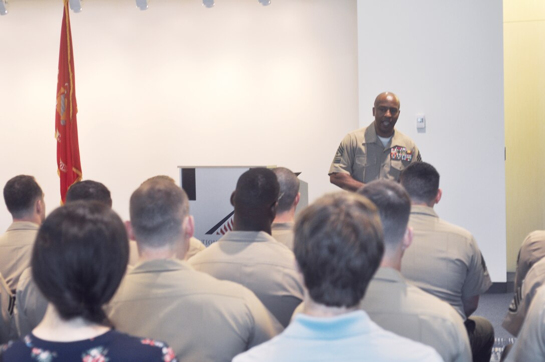Sgt. Maj. Gary Smith, an instructor with the new seminar-based Sergeants Course, gives the graduating sergeants tips on being a leader during his address to the class.